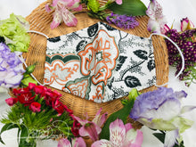 Load image into Gallery viewer, Orange and Hunter Green Silk Floral Mask